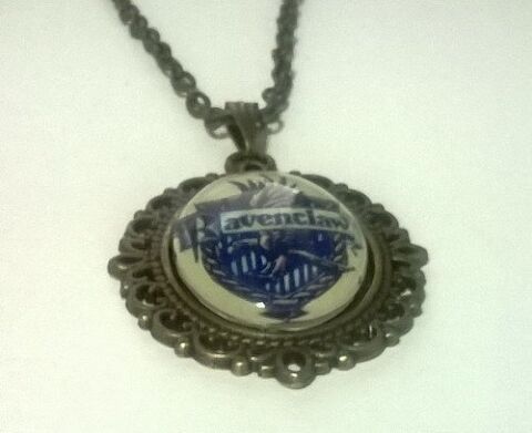 Медальйон Harry Potter Ravenclaw 4х3 см. -   -  