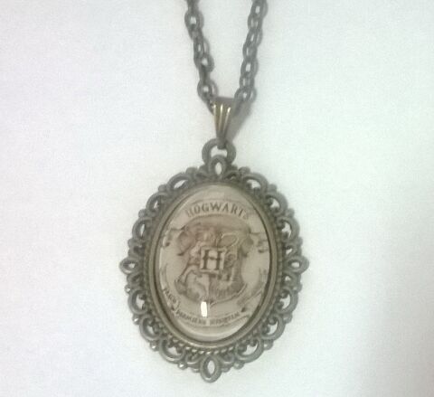 Брелок Harry Potter Hogwarts 4х3 см. -   -  