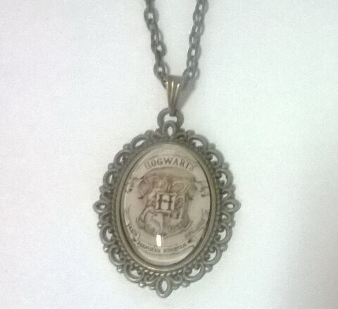 Брелок Harry Potter Hogwarts 4х3 см. -   -  