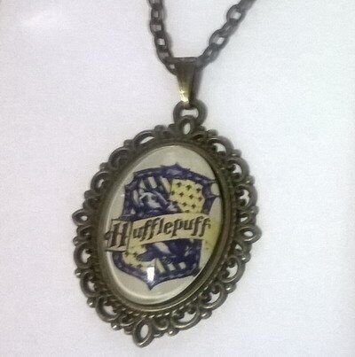 Брелок Harry Potter Hufflepuff 4х3 см. -   -  