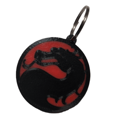 Брелок Mortal Kombat Logo Keychain ABS пластик 4 см. -   -  
