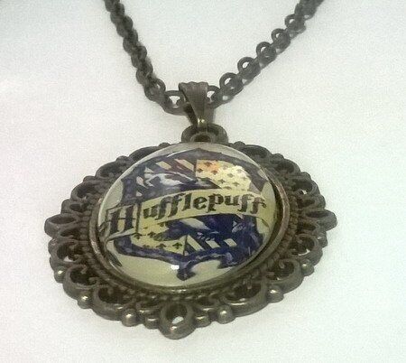 Медальйон Harry Potter Hufflepuff 4х3 см. -   -  